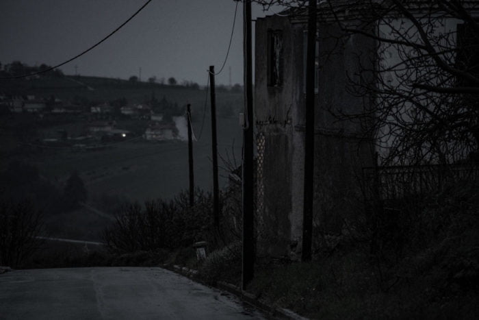 A broken house in darkness