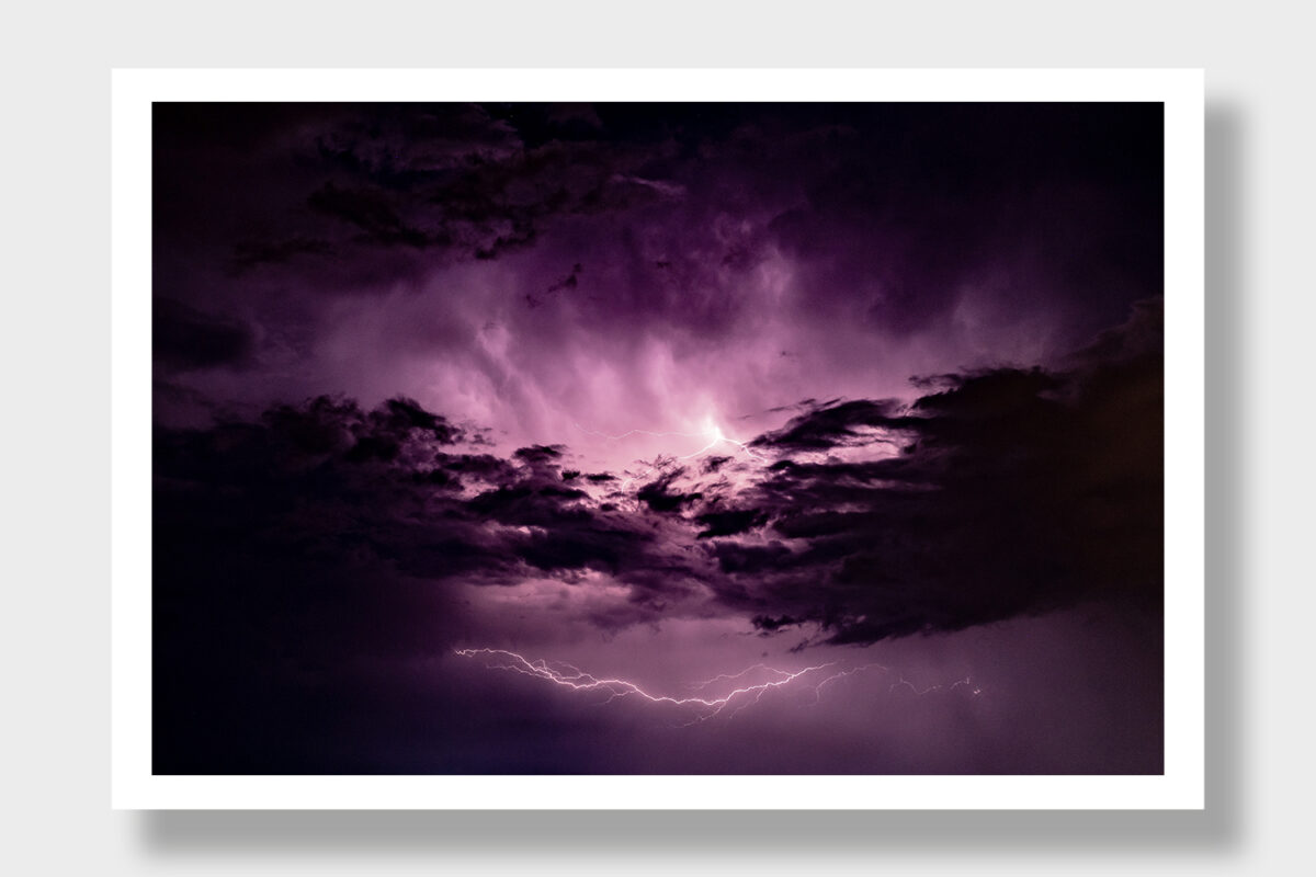 Behold the surreal beauty of a sky painted in shades of violet, alive with the energy of vertical lightning over Greece. This extraordinary image captures the intensity and awe-inspiring nature of a stormy night, offering a glimpse into the power of the elements in the Greek landscape.