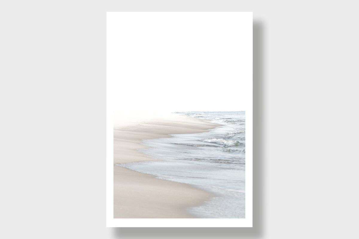 A vertical panorama featuring a harmonious beach in vibrant colors. The image captures the relaxed atmosphere, with gentle waves kissing the golden sand and the sky radiating in bright hues. An uplifting view of a picturesque coastal landscape that combines tranquility and natural beauty.