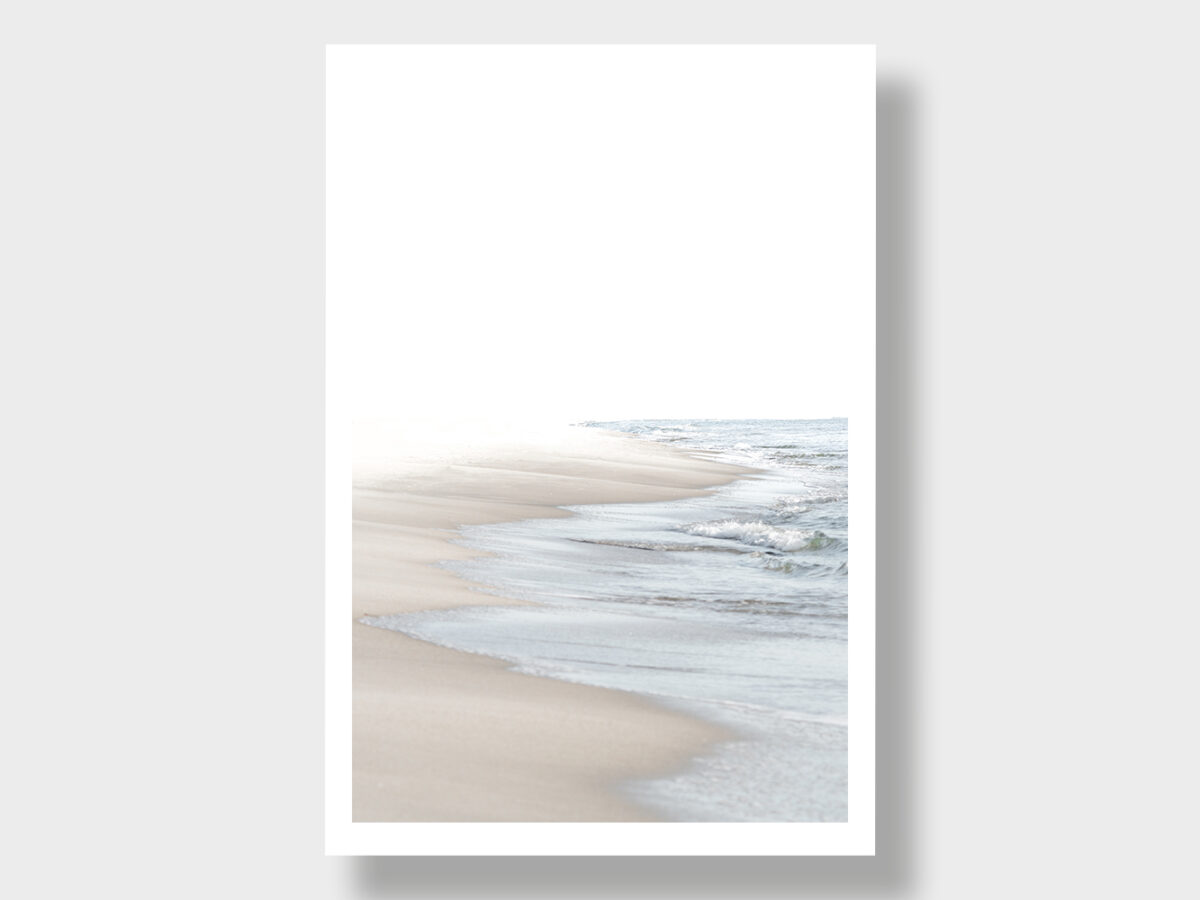 A vertical panorama featuring a harmonious beach in vibrant colors. The image captures the relaxed atmosphere, with gentle waves kissing the golden sand and the sky radiating in bright hues. An uplifting view of a picturesque coastal landscape that combines tranquility and natural beauty.