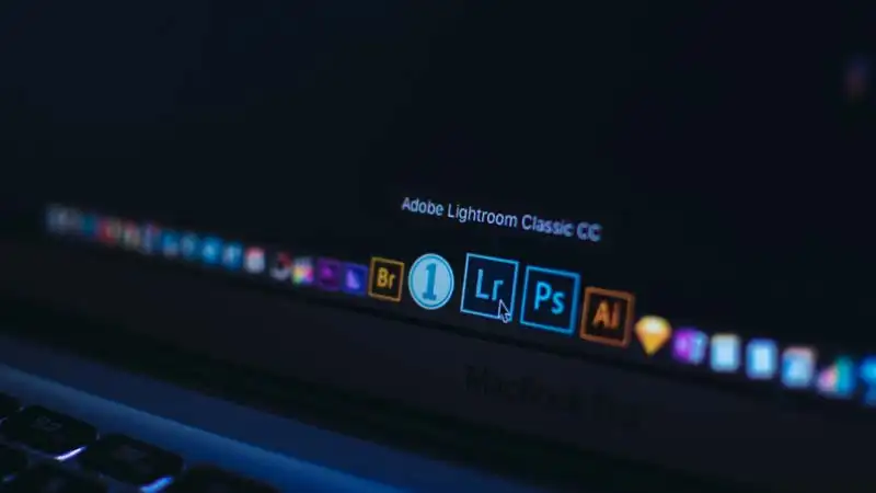 DNG ISO Certification Photo editing software icons on computer screen