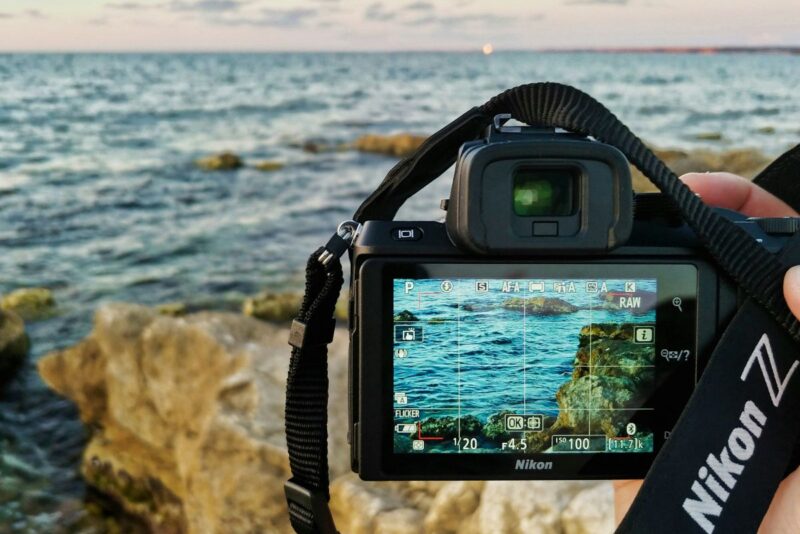 Nikon Z camera photographing rocky seaside at sunset