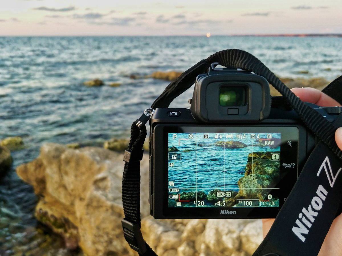 Nikon Z camera photographing rocky seaside at sunset